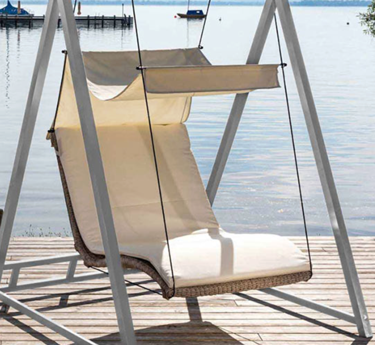 Spa Living Heaven Swing Double Lounger in spa furniture, showing a comfortable double outdoor lounge with cushions and sleek design.
